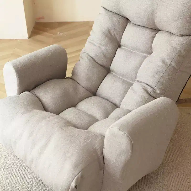 Fauteuil GDFStudio Sorrel moderne pivotant à 360° en lin avec dossier réglable et pouf