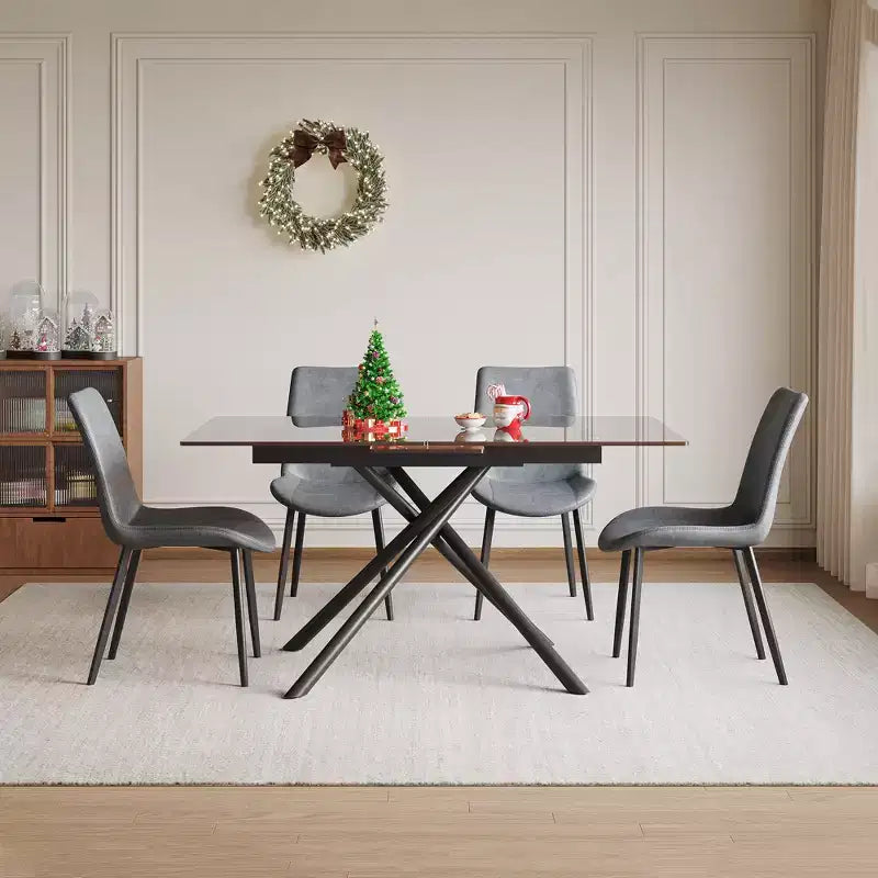 Ensemble de salle à manger contemporain GDFStudio Noemi 5 pièces avec table en verre extensible et chaises rembourrées en similicuir